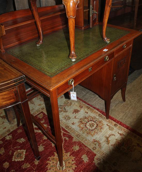 A Swedish Art Nouveau walnut writing table, by Nordiska Kompaniet of Stockholm, W.3ft 4in.